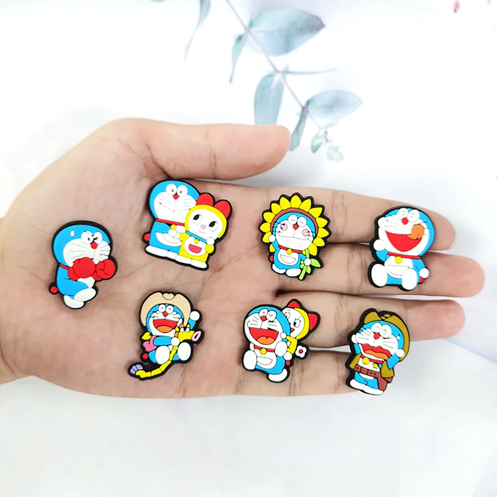 Juguetes calientes Dingdang gato Robot gato 12-100 Uds adornos para zapatos accesorios decoraciones PVC clásico hebilla de zueco para fiesta regalos de navidad aplicar