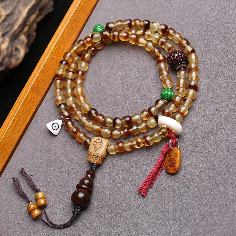 

108-bead natural gold-plated Buddhist rosary: mountain tortoise, barrel, old bone, glass melon and buffalo horn beads