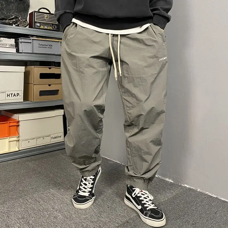 

Lightweight American Casual Loose Fit Running Trousers for Men Breathable Qui Dry Cargo Pants Youth Active Sle Polyester ...
