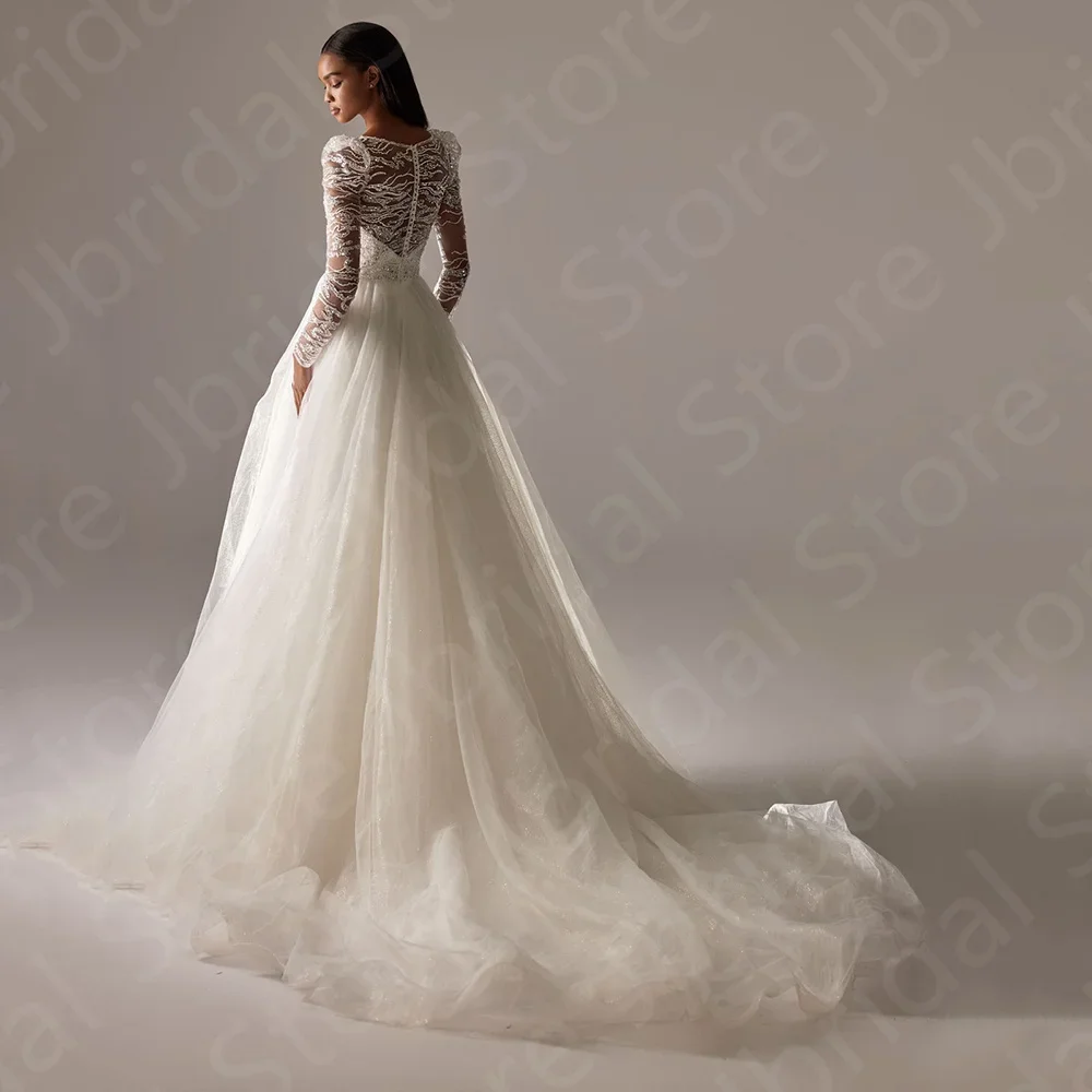 Gorgeous Sparkling Wedding Dresses 2024 Long Sleeves Bridal Gowns Scoop Neck Beading Wedding Gown Sequined Robe de mariée New