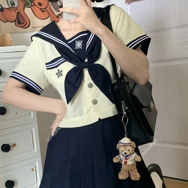 Ricamo giapponese Nuovo uniforme JK Stile Ins Uniforme da marinaio Stile college Abito con gonna a pieghe stile college a maniche lunghe Gioventù