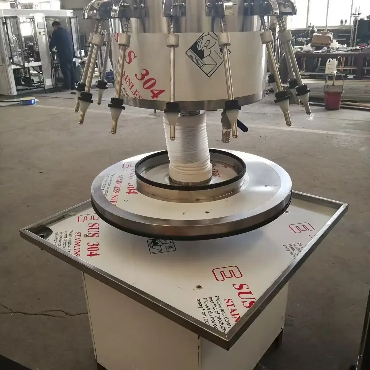 

TLF and Whisky Bottling Filler Small Vodka Juice Spirits Liquor Siphon Type Bottle Filling Machine