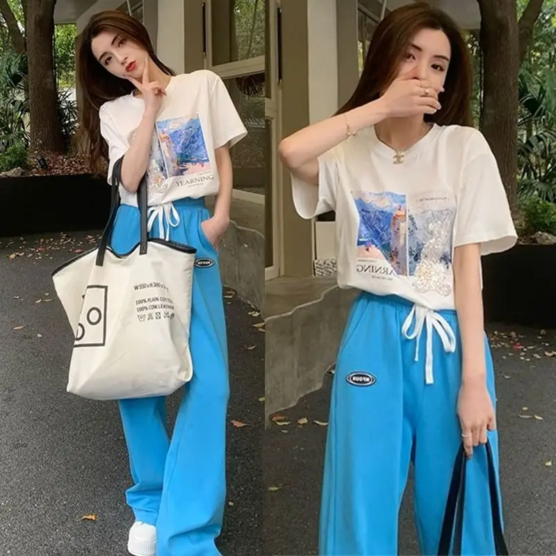 패션 여성 세트 봄과 여름 한국어 버전 간단한 반팔 루즈 캐주얼 와이드 레그 팬츠 투피스 세트