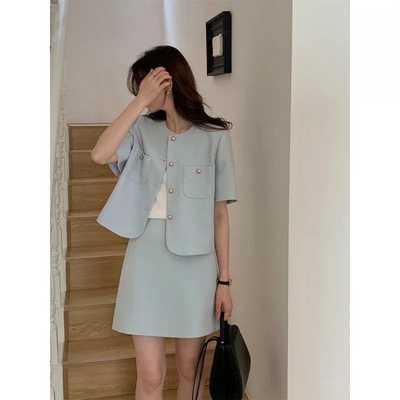 

Women's Set 2023 Summer New Short Sleeve Single Breasted Versatile Commuter Coat High Waist A-line Short Skirt Two Piece Set