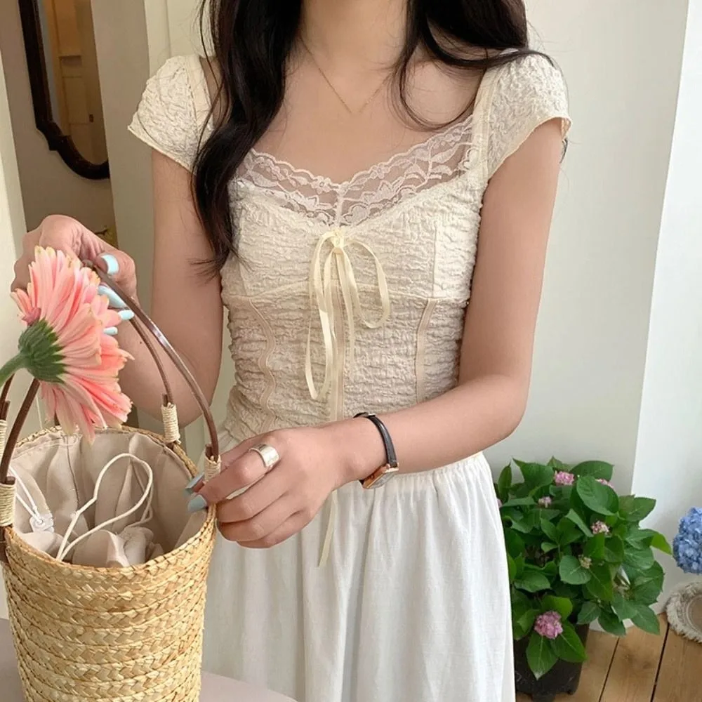 

Ins Sweet Тонкий укороченный топ Женская одежда Корейский стиль Футболка с короткими рукавами Пикантная нижняя рубашка для девочек Футболка с кружевным бантом Лето