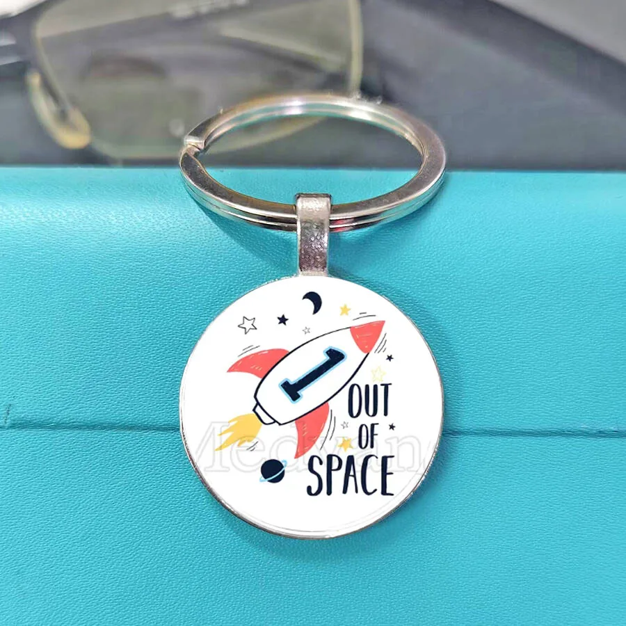 Hot Sale  Cartoon rocket spaceship space keychain creative rocket space pendant glass dome key chain backpack car key gift