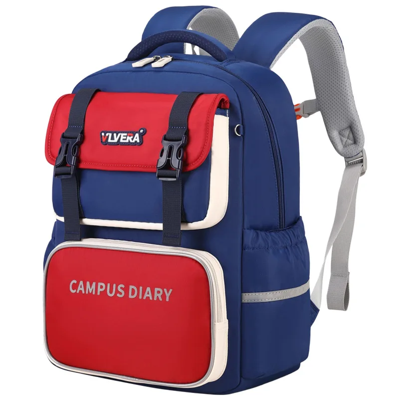Mochila escolar para niños, de gran capacidad, ideal para estudiantes de primaria, con diseño de bloques de color, tipo bandolera, con múltiples bolsillos.