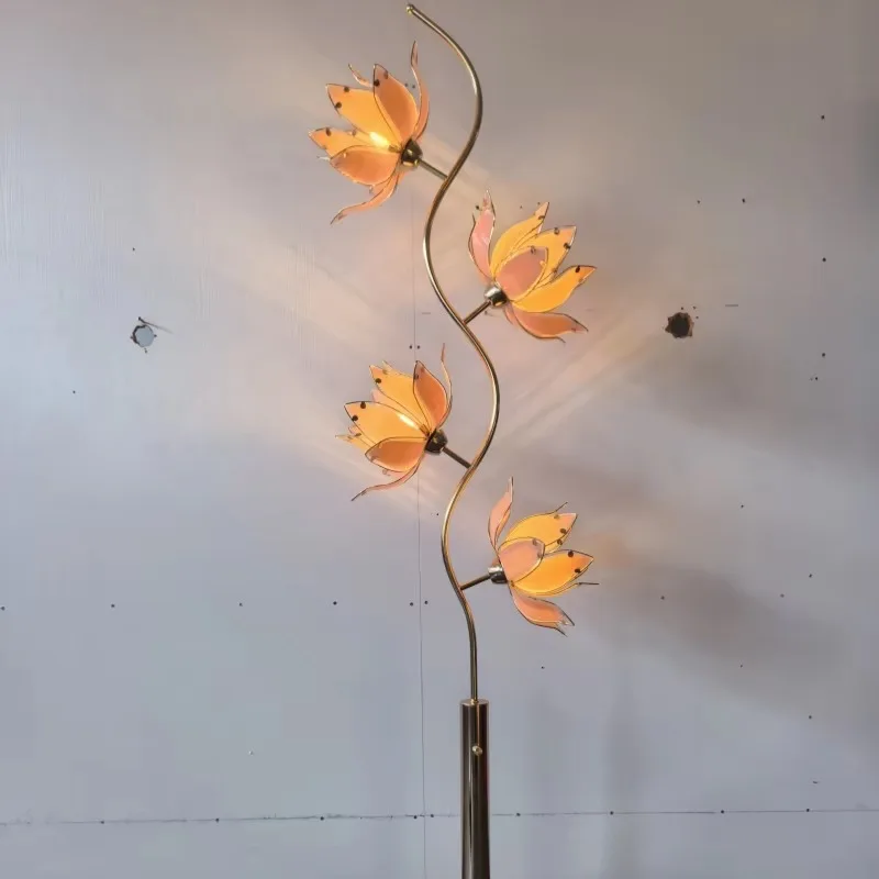 The new light luxury metal lotus fall floor lamp, high-end glass flower arrangement living room bedroom