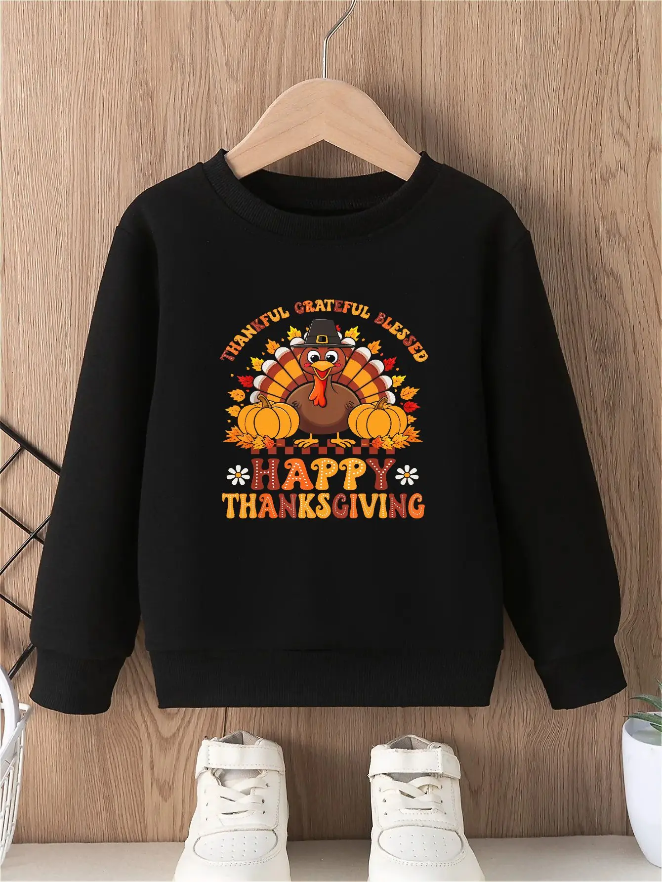 

Happy Thanksgiving boys' crew neck sweatshirt featuring a cheerful turkey and autumn leaves comfortable long-sleeved top