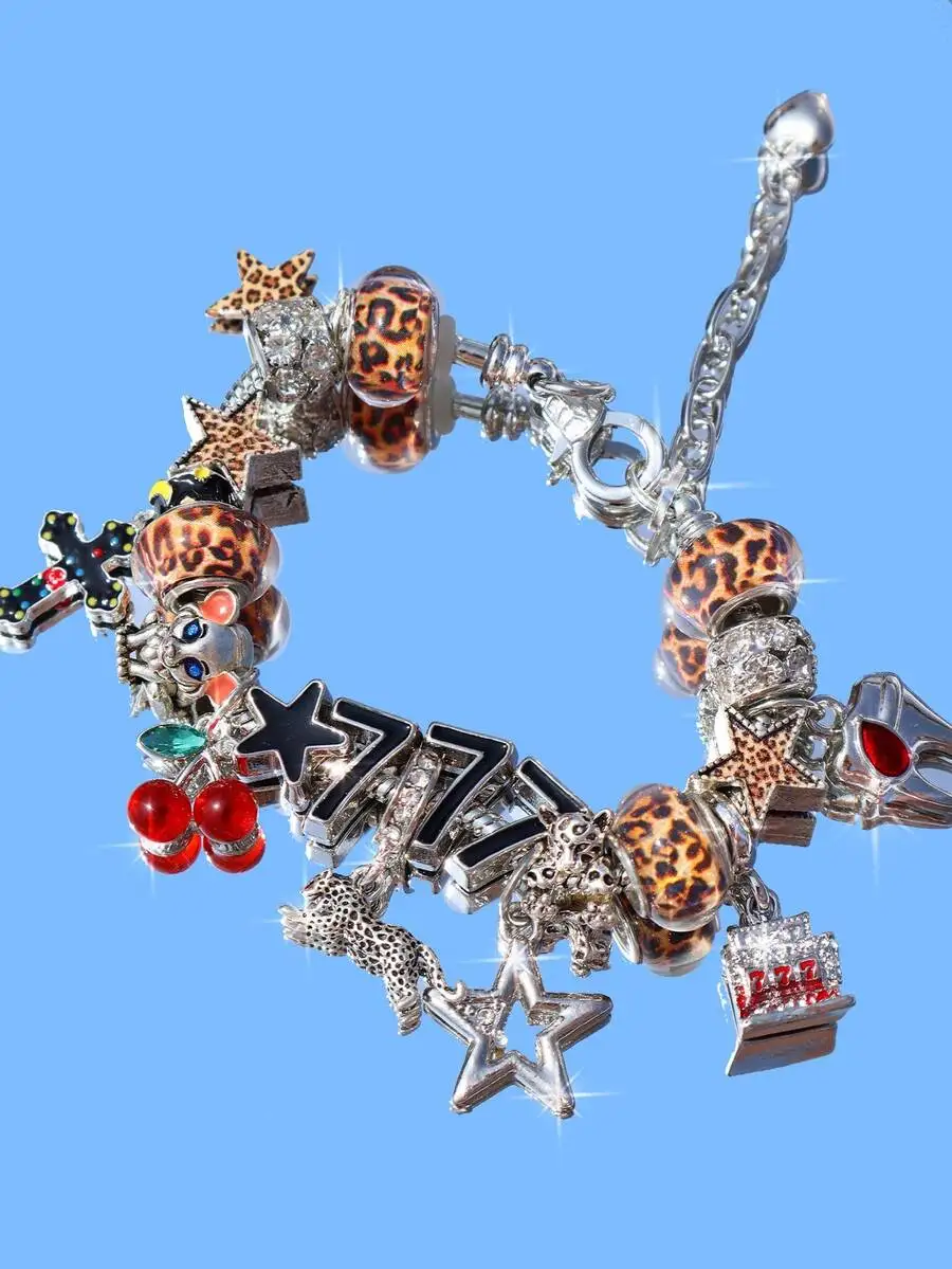 

Leopard Print Charm Bracelet With Stars Cross 777 Red Cherry And Animal Charms