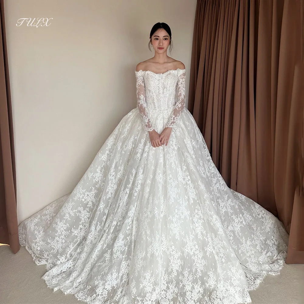 ชุดแต่งงานลูกไม้สีงาช้างหรูหรา TULX สไตล์เกาหลี ถ่ายรูป ชุดเจ้าสาวแขนยาวเปิดไหล่ คอร์เซ็ทสั่งตัดได้ 웨딩드레스