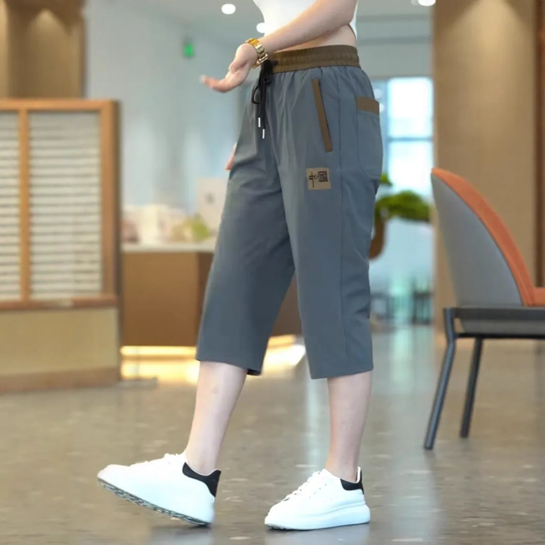 

Мужские модные брюки свободного кроя с эластичным поясом, удобные, повседневные, быстросохнущие, укороченные (7/8), прямые, из полиэфирного волокна