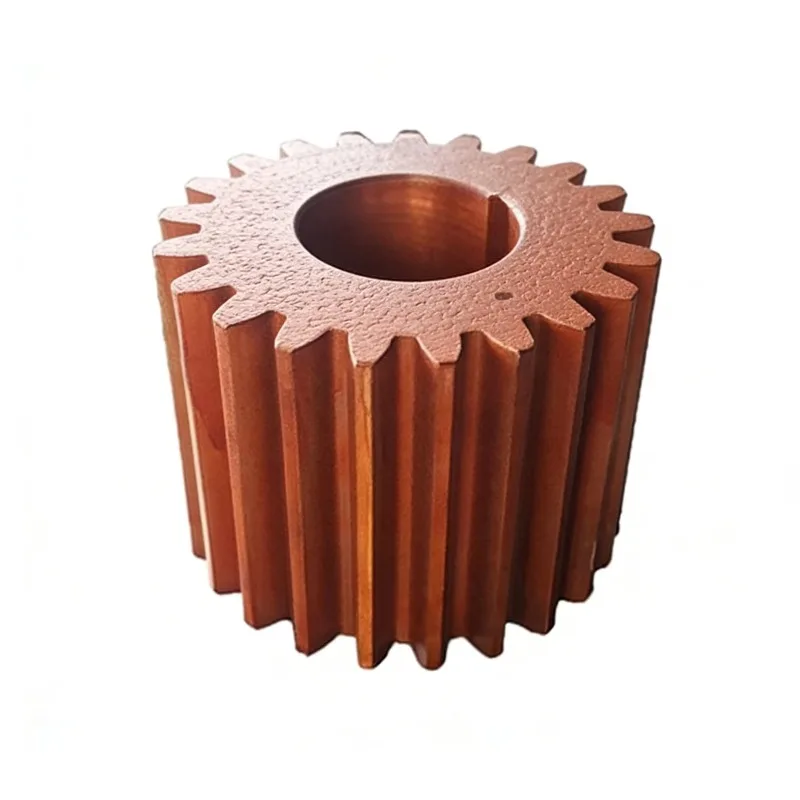 Surface coated anti-rust ball mill pinions for humid mining environments