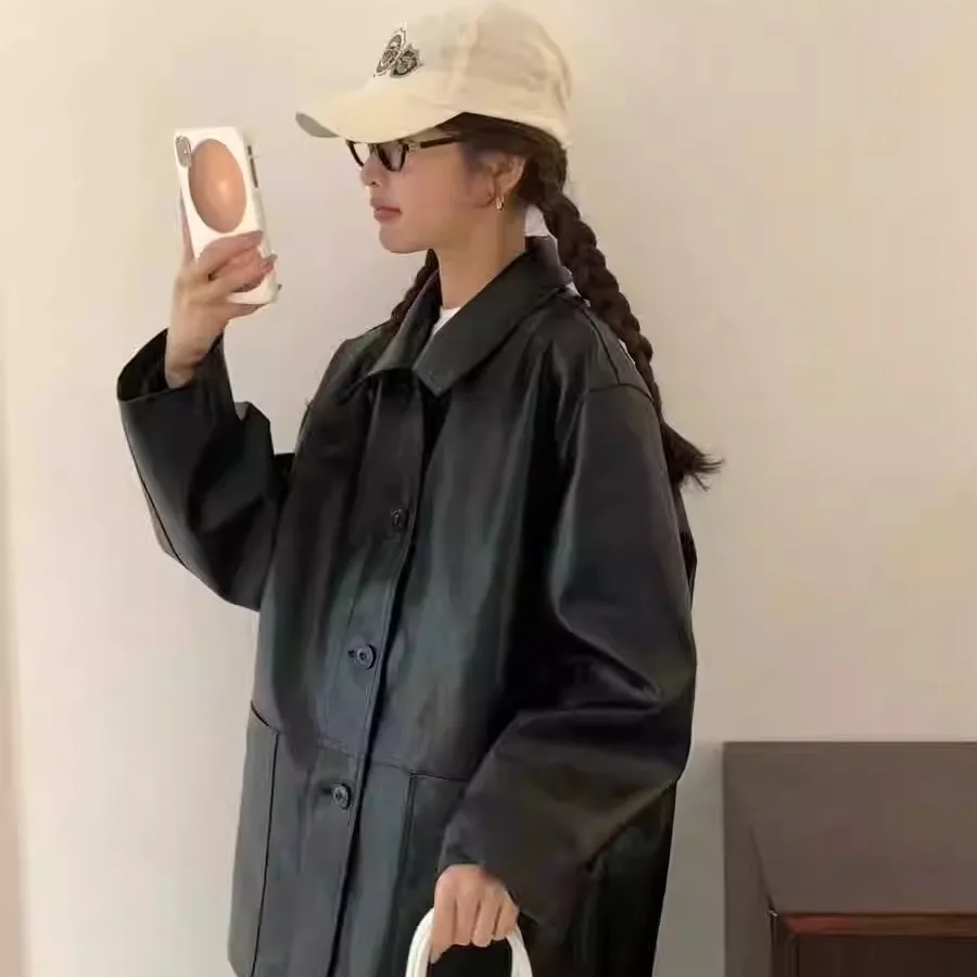 เสื้อโค้ทหนังสไตล์เรโทรหลวมๆ กระดุมเดี่ยว ปกเสื้อแบบแจ็คเก็ต  คอลเลคชั่นใหม่ฤดูใบไม้ร่วง เสื้อคลุมแฟชั่นผู้หญิง  ทรงยาว  วัสดุ PU