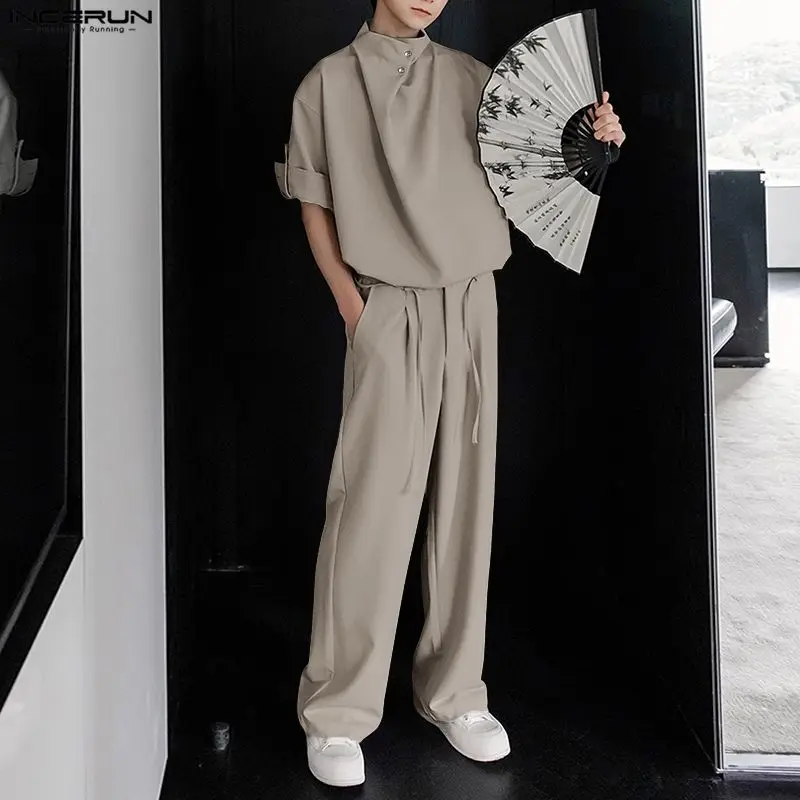 

INCERUN мужские комплекты однотонные плиссированные рубашки и брюки комплекты из двух предметов свободная уличная одежда 2025 модные мужские повседневные костюмы S-5XL