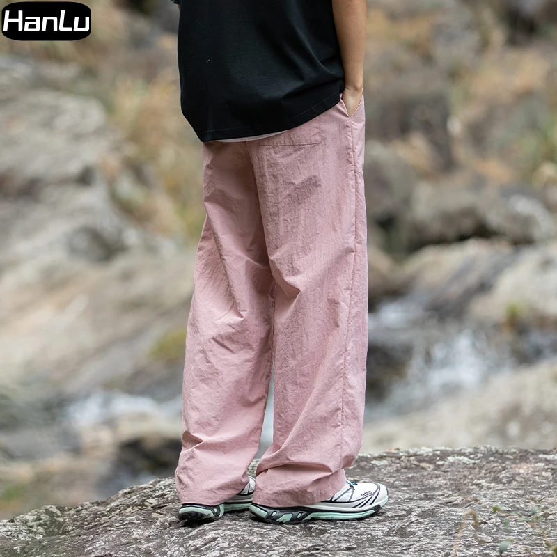 Pantaloni Casual da uomo primavera/estate nuovo tubo dritto pantaloni da lavoro moda Hip Hop pieghettati sottili da donna