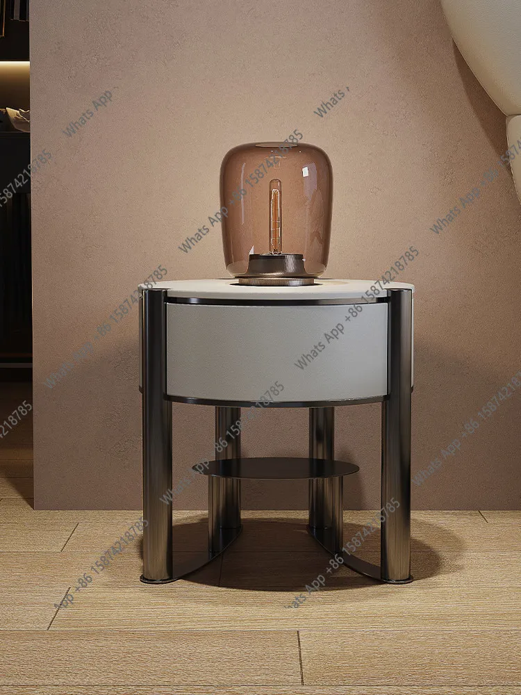 

Minimalist light luxury rock slab bedside table Modern bedroom storage Bedside table Designer special-shaped bedside table