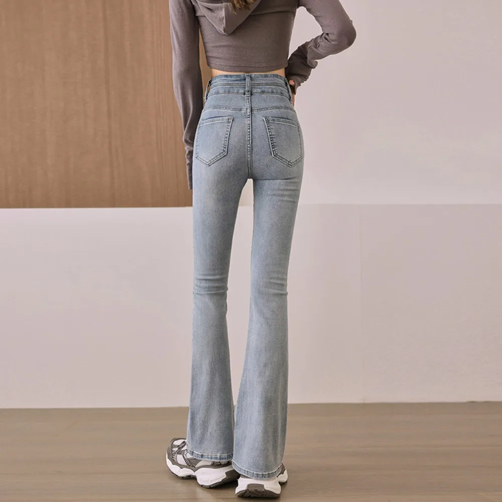 กางเกงยีนส์ทรงบลูมสำหรับผู้หญิง เอวกลาง ทรงบอยเฟรนด์ ผ้ายืด กระดุมผ่าหน้า ทรงบูทคัท ดีไซน์ทันสมัยปี 2025