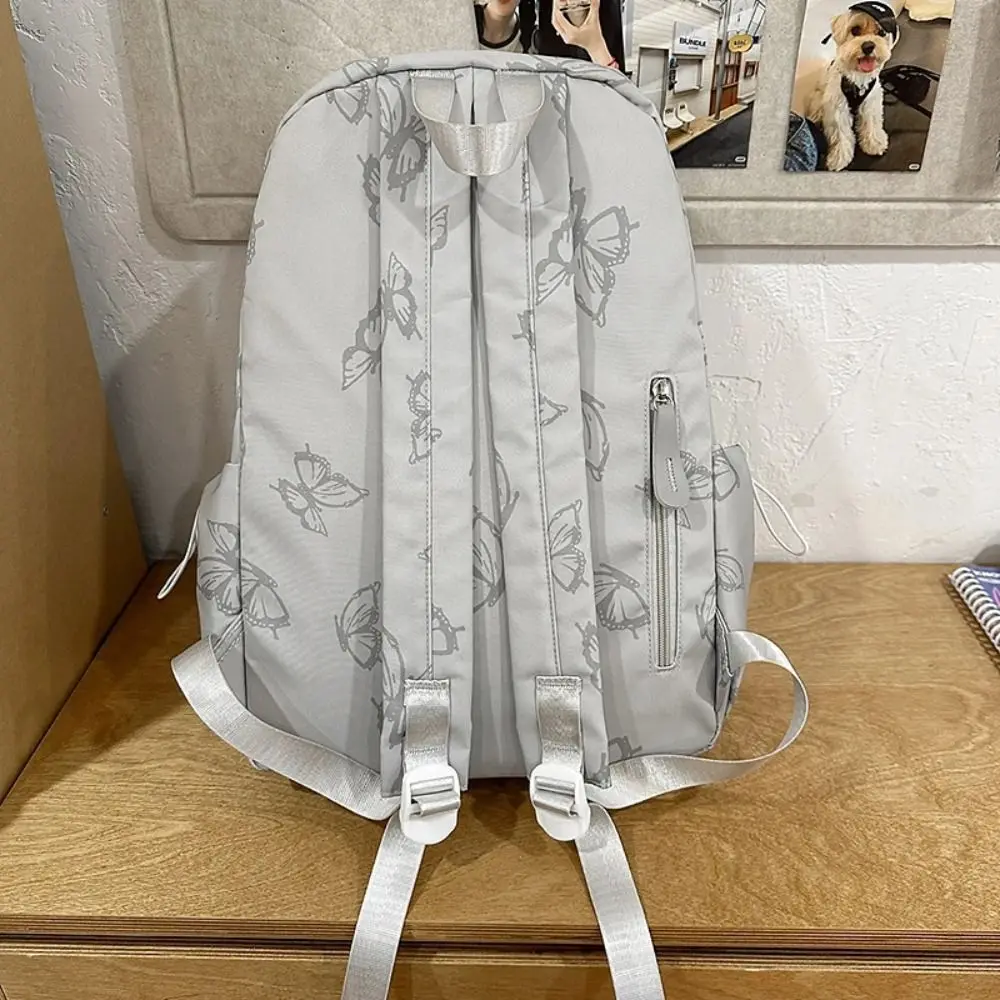 حقيبة ظهر مبتكرة صغيرة على شكل فراشة على الطراز الكوري حقيبة يد بسحاب حقيبة كتف بلون سادة حقيبة ظهر رياضية كاجوال للسفر