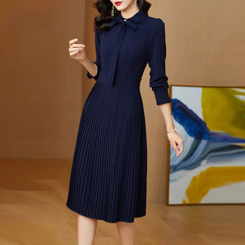 

Female dress 2023 spring solid color long sleeve dress slimming temperament ladies women's lesk pleated skirt wood ear shirt