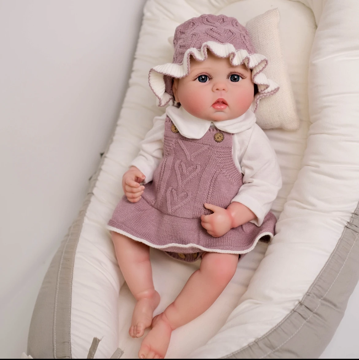 

22 inch Lucy Lifelike Toddler Reborn Doll- Poseable Arms with Hand-Painted Baby Fat Folds Gift for Girls