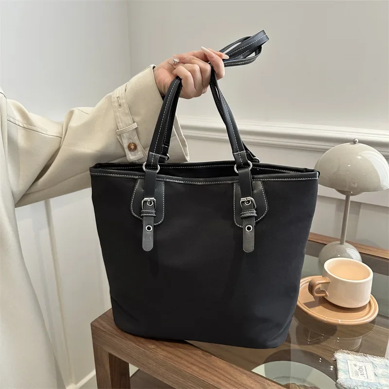 Large capacity fashion Korean version splicing handbag  early spring new versatile ins shoulder armpit bag tote bag