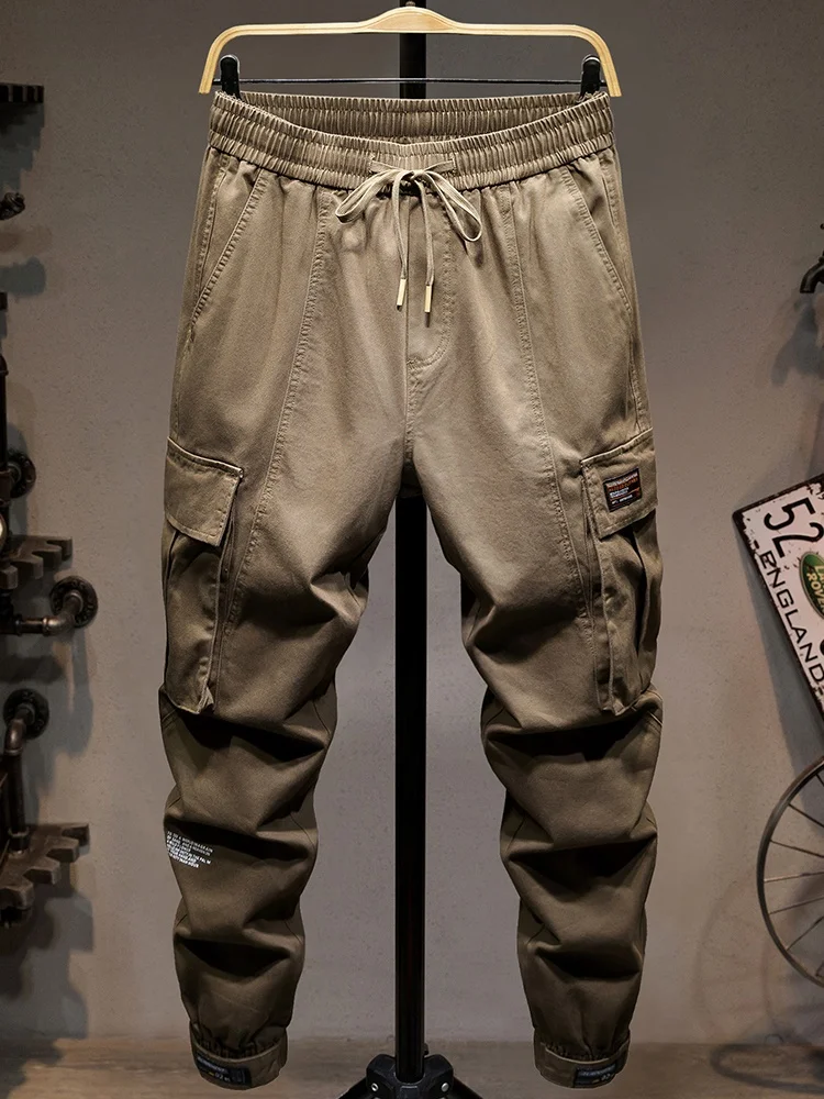 

Легкие хлопковые рабочие брюки для мужчин, свободные повседневные брюки для активного отдыха, дышащие, модные, молодежные, с несколькими карманами и шнурком
