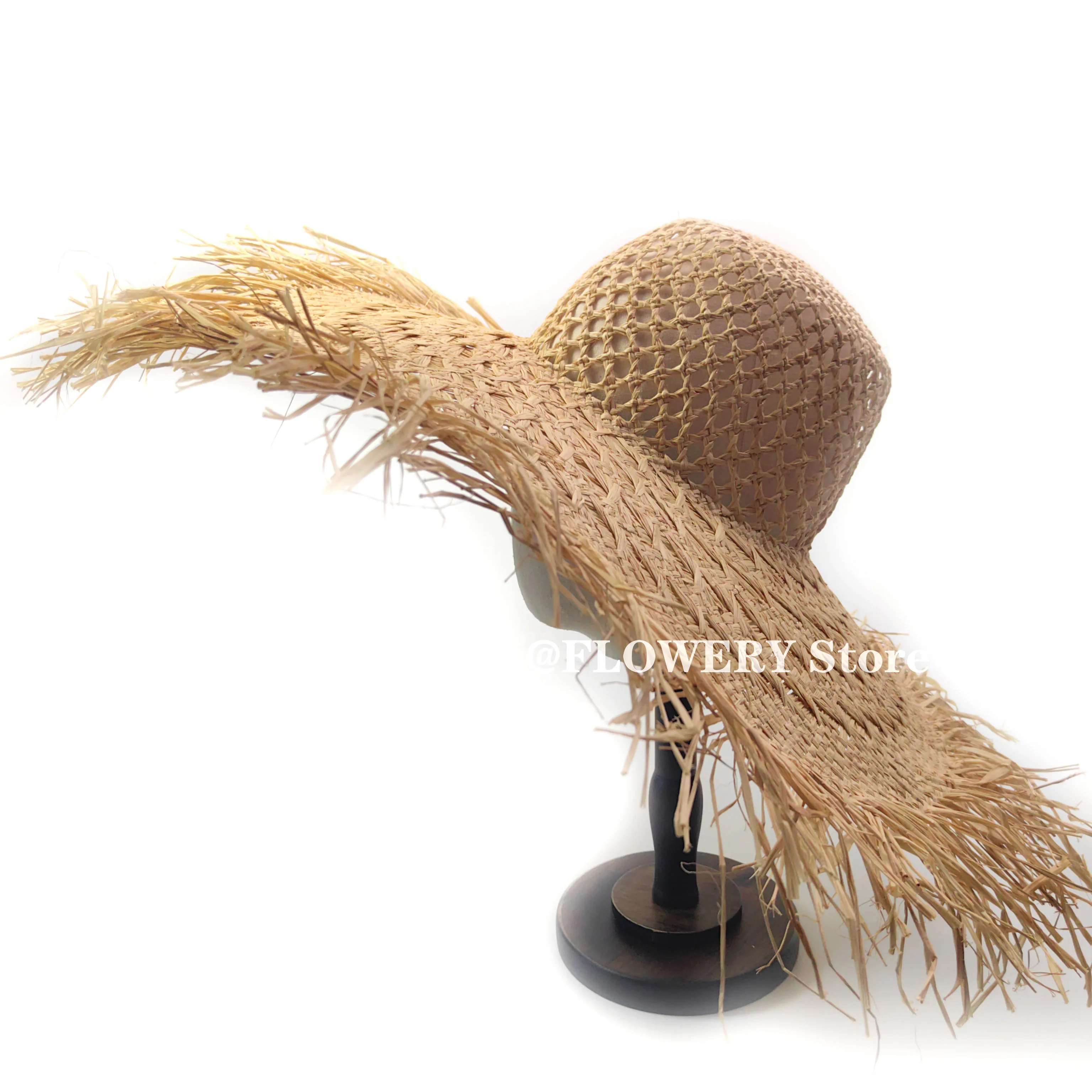 

New spring and summer open-weave hand-woven rattan hat for beach vacation and sun protection wide-brimmed hat