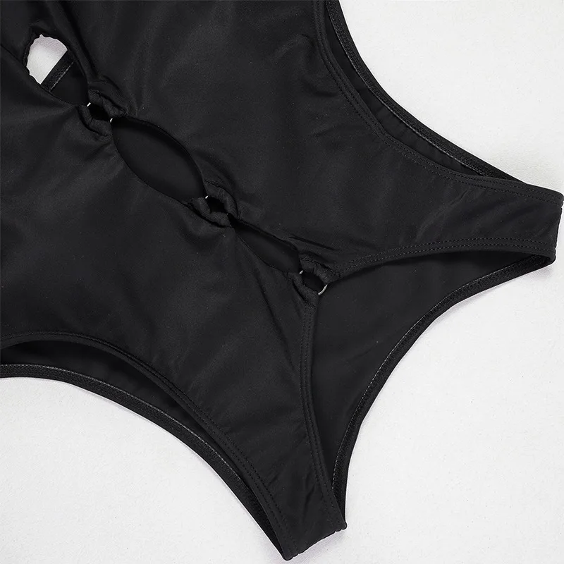 ملابس سباحة أوروبية وأمريكية جديدة لعام 2025 برقبة دائرية مجوفة من قطعة واحدة ملابس سباحة مثلثة للنساء بلون شاطئ البحر