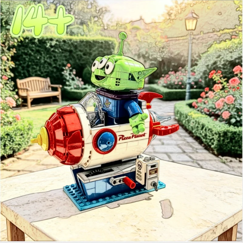 570pcs 2026 Popular Three Eyed Alien Building Blocks Classic Movie Pizza Planet Rocket Ride Diy Assembly Model Desktop Ornament
