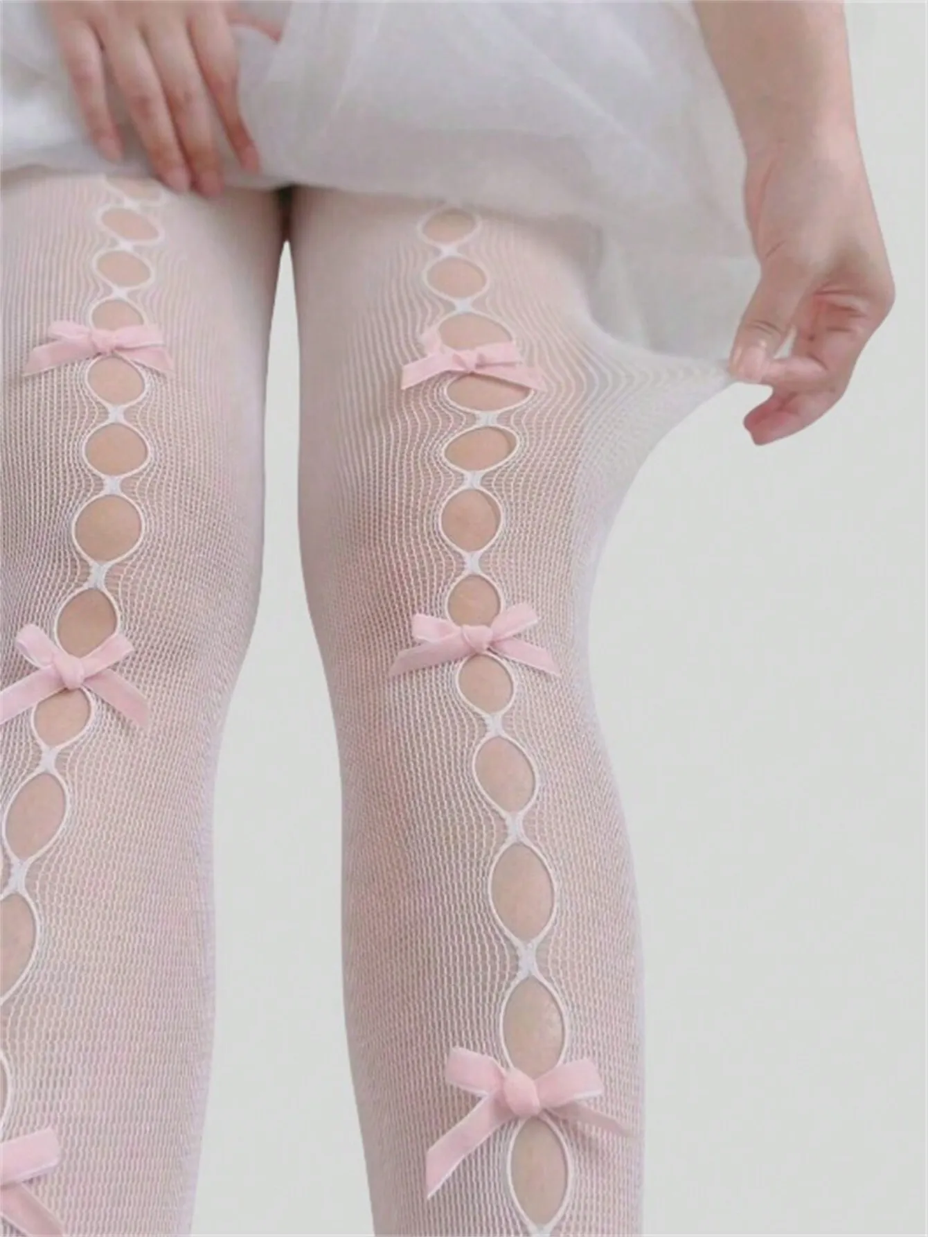 

Sheer Mesh Stockings with Pink Bow Accents and Cutout Detail