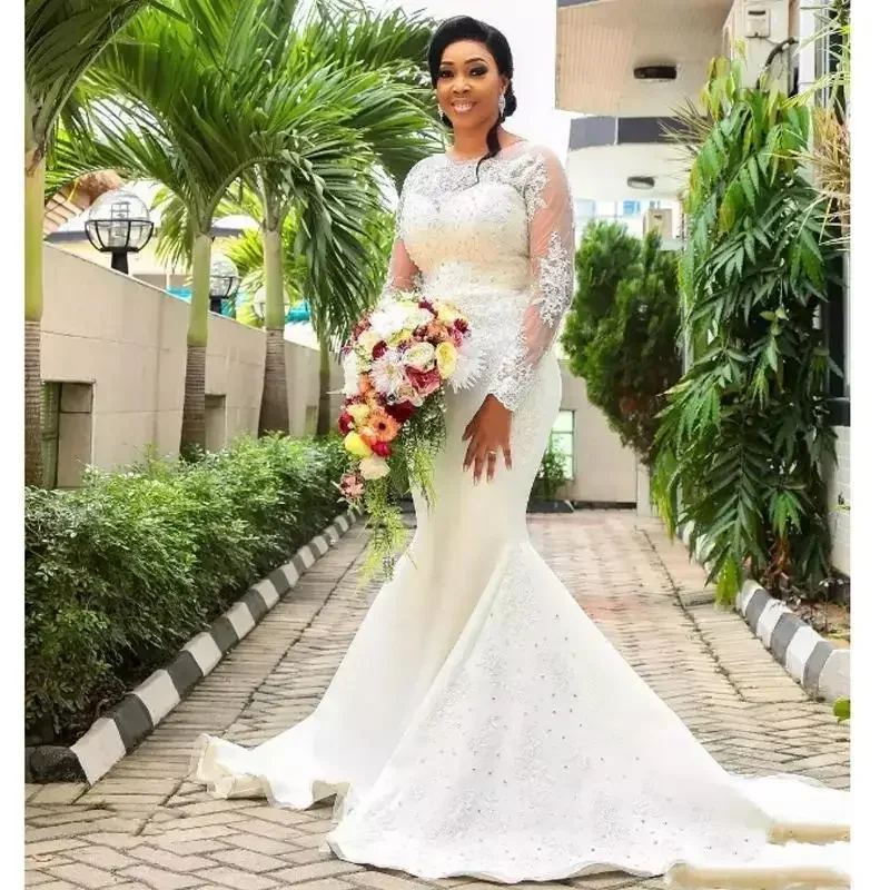 Maßgeschneiderte Vintage-Spitze-Meerjungfrau-Brautkleider, transparente lange Ärmel, Juwelenapplikationen, Perlen, Sweep-Zug, afrikanische Plus-Size-Brautkleider