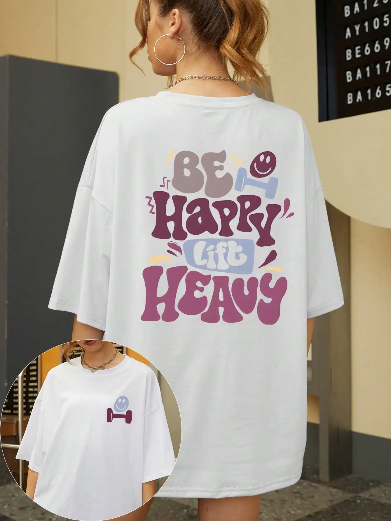 

Be Happy Lift Heavy Graphic T-Shirt for Women, Oversized Fit, Casual & Gym Wear, Fun Fitness Motivation Tee
