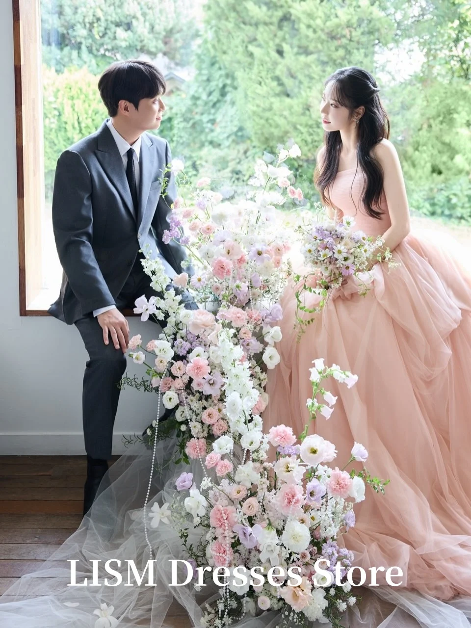 ชุดราตรีทรงเอไลน์แบบไร้สาย รุ่น LISM สีชมพู ผ้าไหมทูลล์ สำหรับถ่ายภาพ งานพรอม งานราตรี สามารถสั่งตัดได้