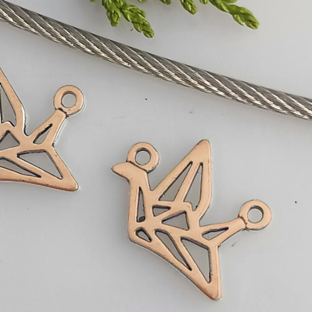 

100pcs Hollow Paper Crane Pendants Vintage Alloy Jewelry Making Supplies Key Chain Car Decor Charm Accessories