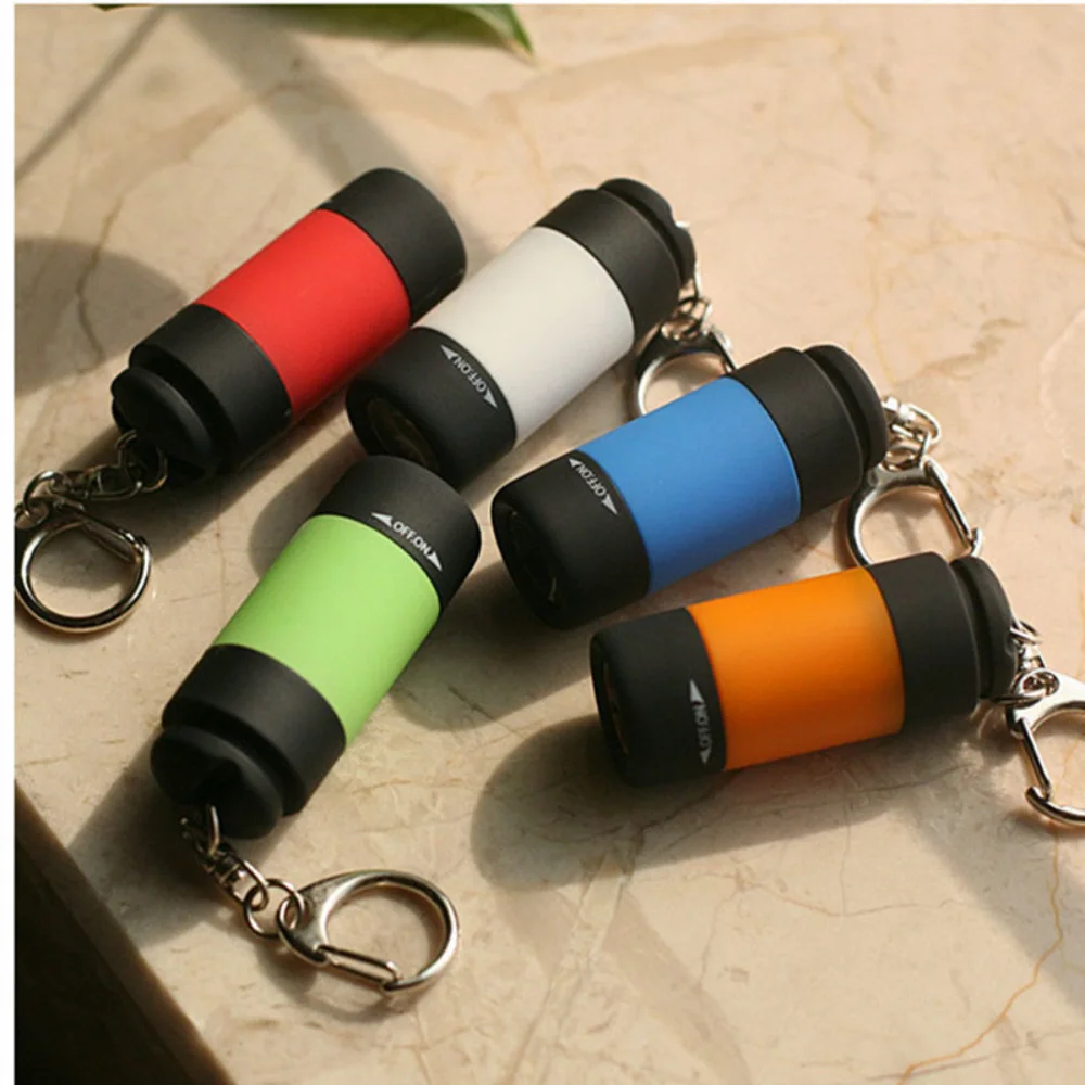 ไฟฉายพลาสติกขนาดเล็กพกพาสะดวกแบบพวงกุญแจ ชาร์จผ่าน USB จากโรงงานโดยตรง