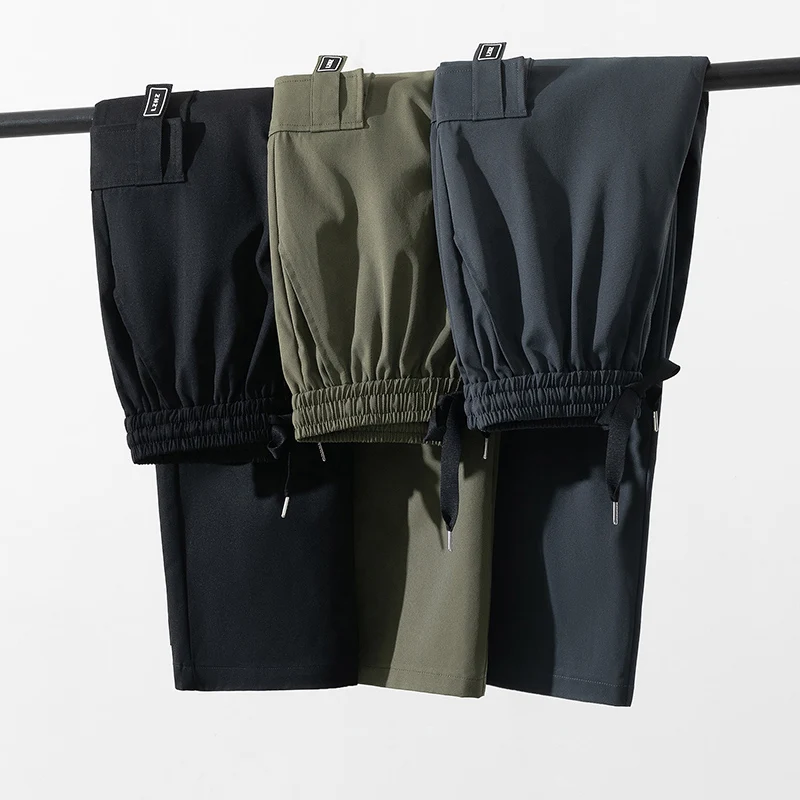 調節可能な巾着ゴムウエストバンド付きのメンズファッショナブルな巾着パンツ、ルーズフィット、マルチカラーのオールシーズン快適さ