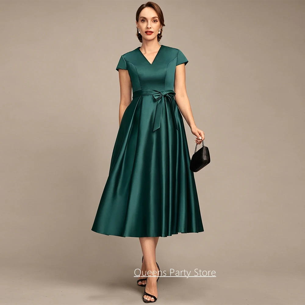 

Customized Simple Mother of The Bride Dress Modern Cap Sleeve V Neck Bow belt Tea Length A Line Wedding Party Gown Pocket