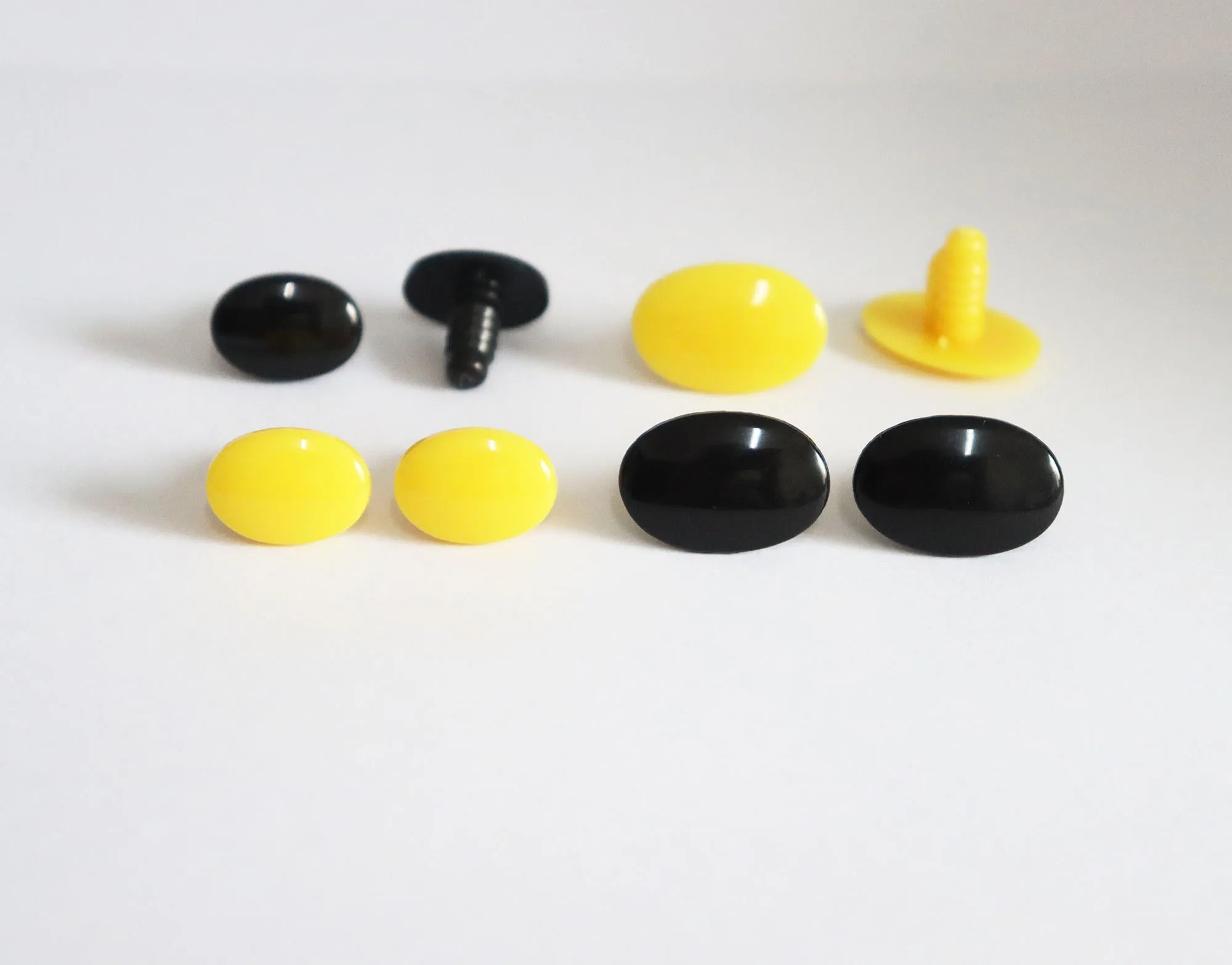 Piezas de juguete ovalado plano de 12x17mm, 15x22mm, amarillo, negro, Ojos de muñeca de seguridad con arandela de presión de mano para muñeca de peluche diy, 50