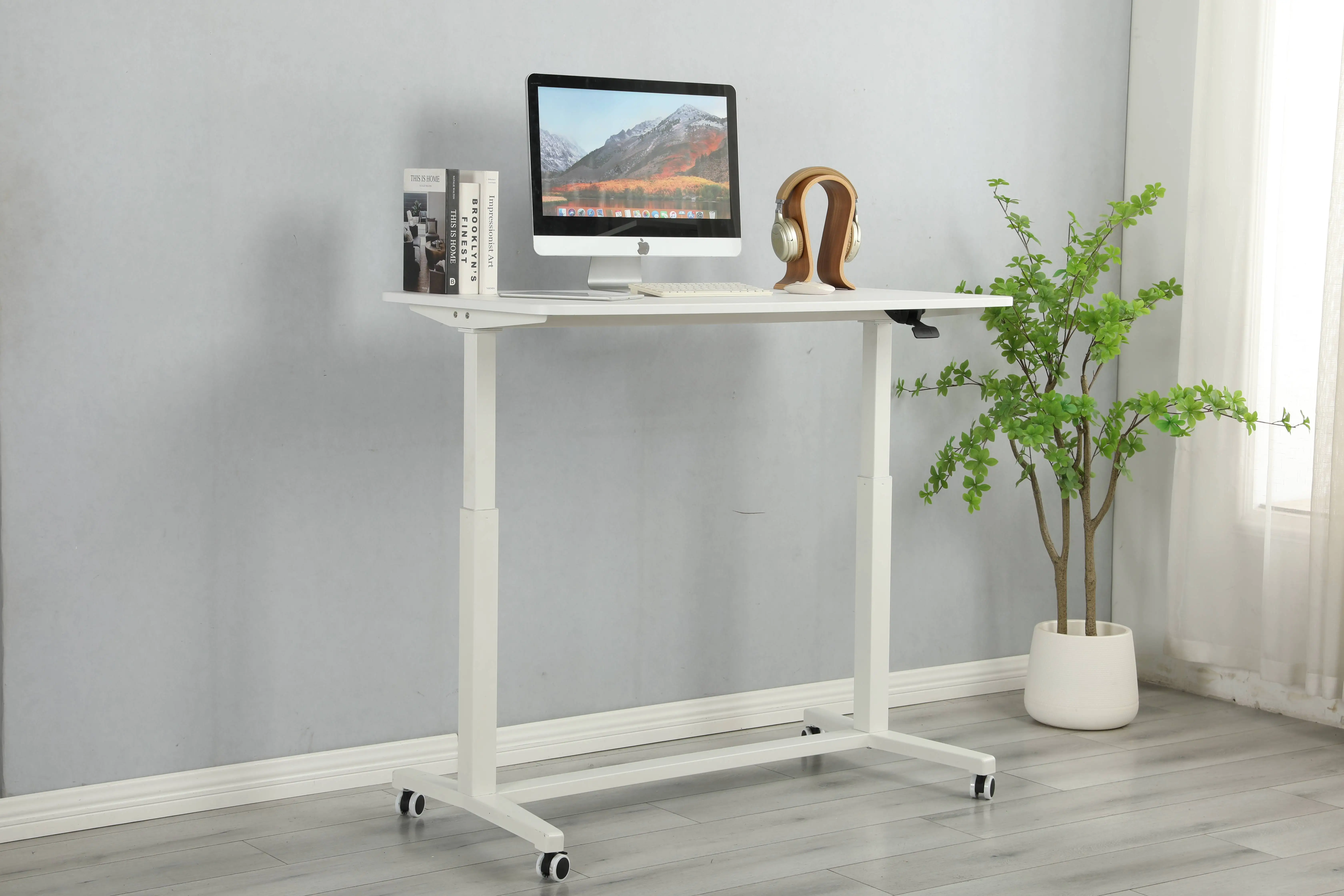 Furniture Ergonomic Gas Standing Height Adjustable Double Columns Table Movable Computer Laptop Desk With 4 Locked Wheels