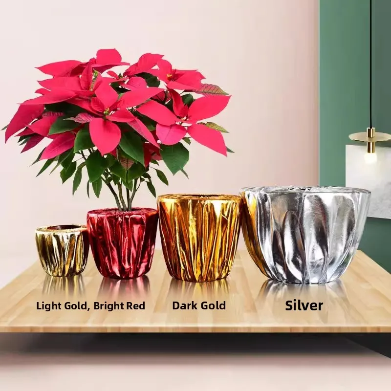 

Праздничный чехол для цветочного горшка Slow Gold: оранжево-золотая ткань, серебристый декор для новогоднего оформления и праздничных композиций