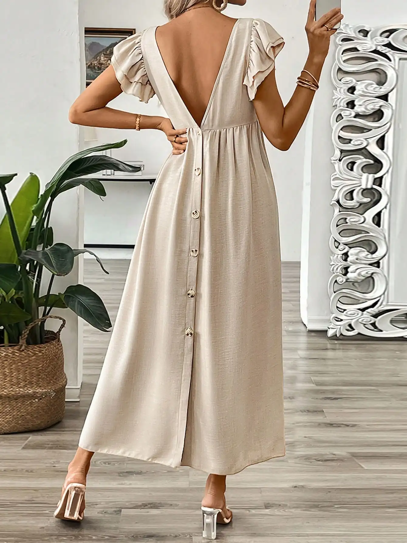 

Bohemian minimalist style V-neck vest dress: deep V neckline; pleated cuffs