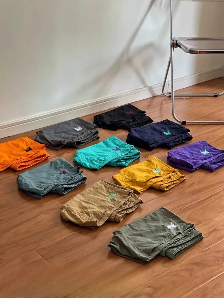 

Dopne Nylon Qui Dry Sports orts Мужчины Женщины Летние тонкие пляжные брюки с вышивкой до колена Fourths Faionable C...