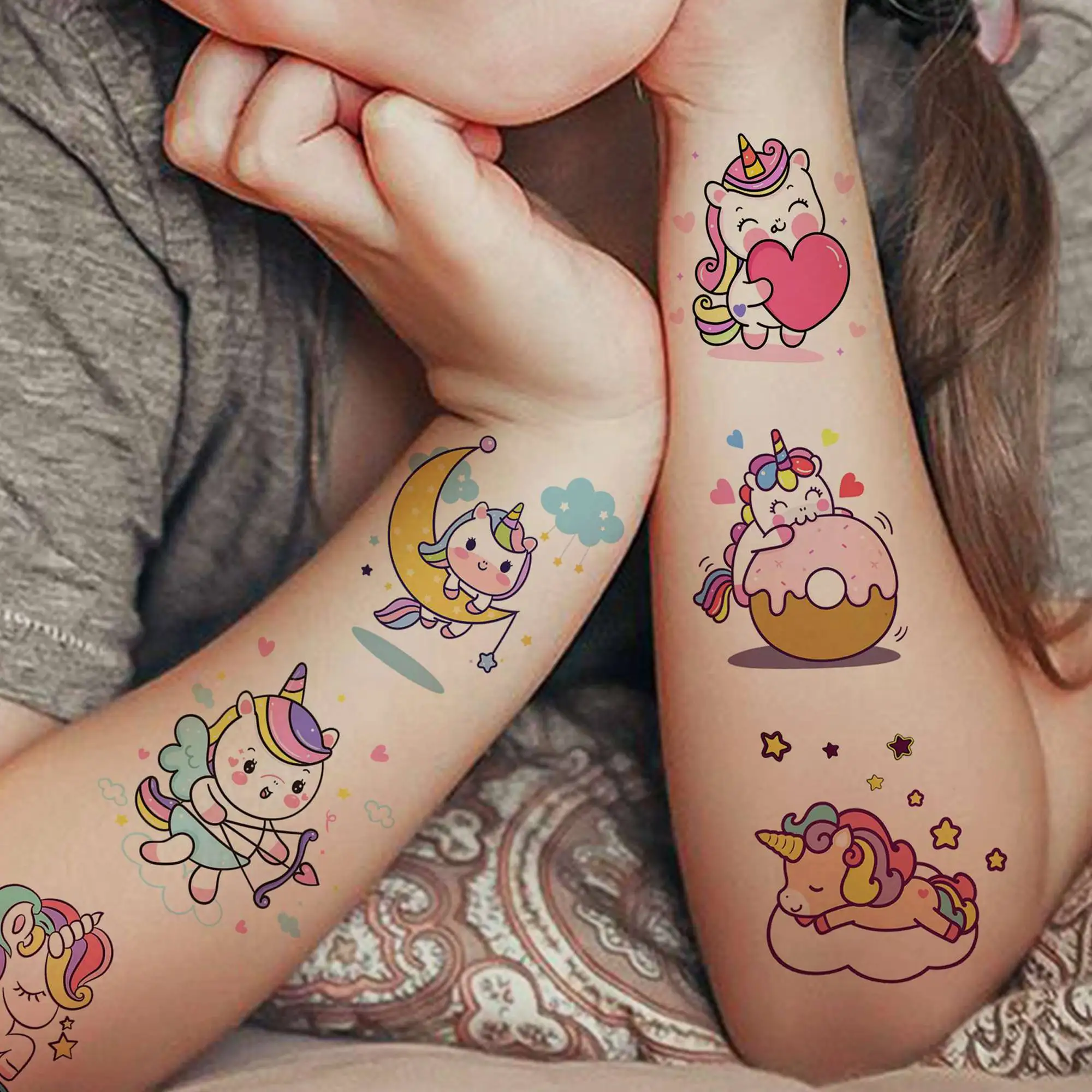 Tatuajes temporales de unicornio para niñas y niños, tatuajes falsos impermeables, pegatina de dibujos animados, regalos de cumpleaños, arte corporal, 50 piezas