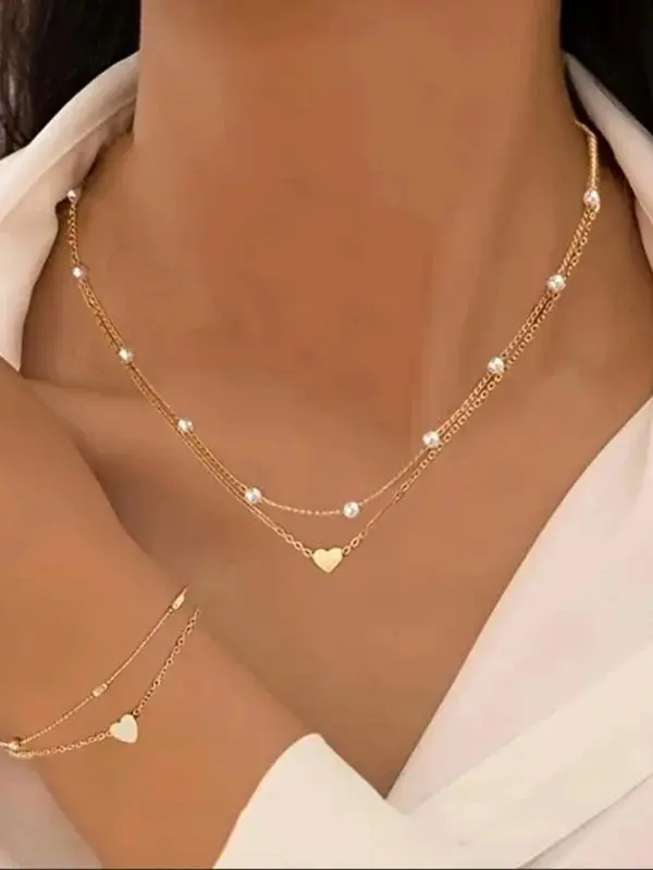 Neues Schmuckset mit Imitationsperlen in Herzform für Damen, in Gold- und Silberfarben, mit runden Perlen, bestehend aus Halskette und Armband, ideal als Schmuck für den täglichen Gebrauch oder als Geschenk. – Detail 3