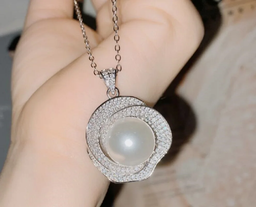 

Fine Jewelry AAAA round pearlpendant 12-11mm pendant 925s