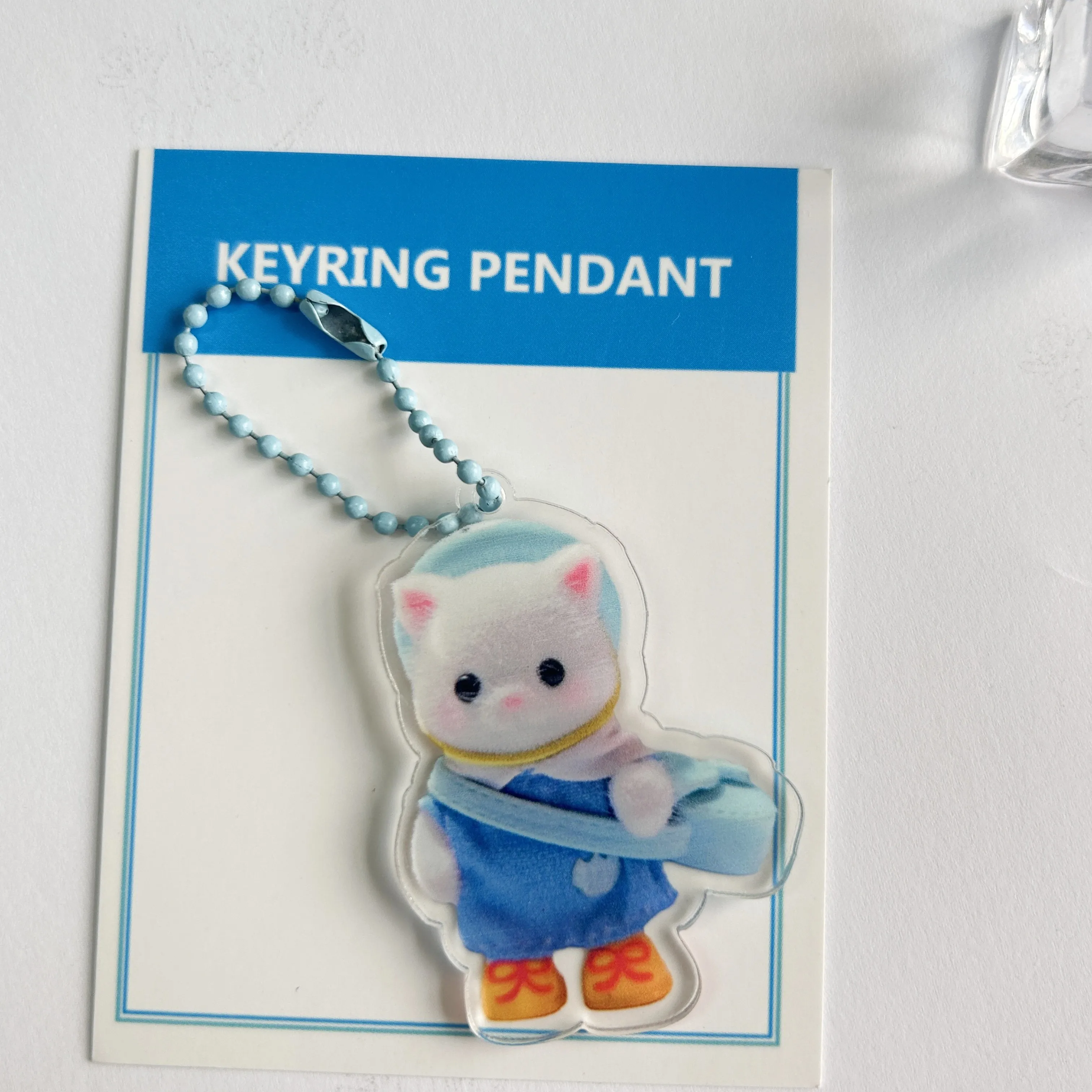 Porte-clés double face en acrylique de dessin animé Sylvanian Families, porte-clés, pendentif, style INS, accessoires de sac, cadeau mignon, 2 pièces, ensemble