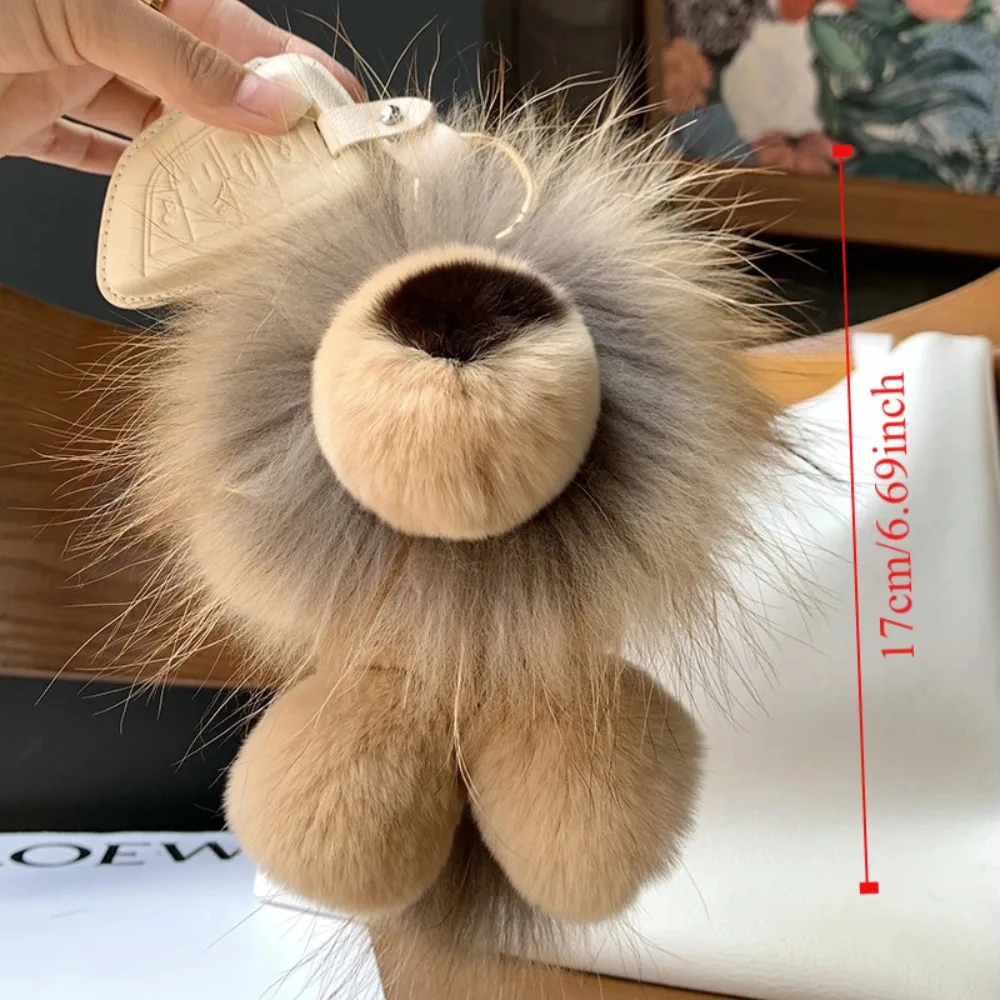 Simpatico portachiavi con ciondolo a forma di leone piccolo simpatico cartone animato in vera pelliccia di coniglio Rex borsa ornamenti portachiavi per auto cinturino in pelliccia regalo di peluche per bambini