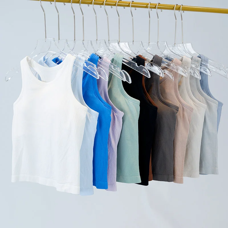 

Женский спортивный укороченный топ, высокоэластичный трикотаж в рубчик, летний нейлон, корректирующий фигуру, удобный, со встроенными чашечками для груди.