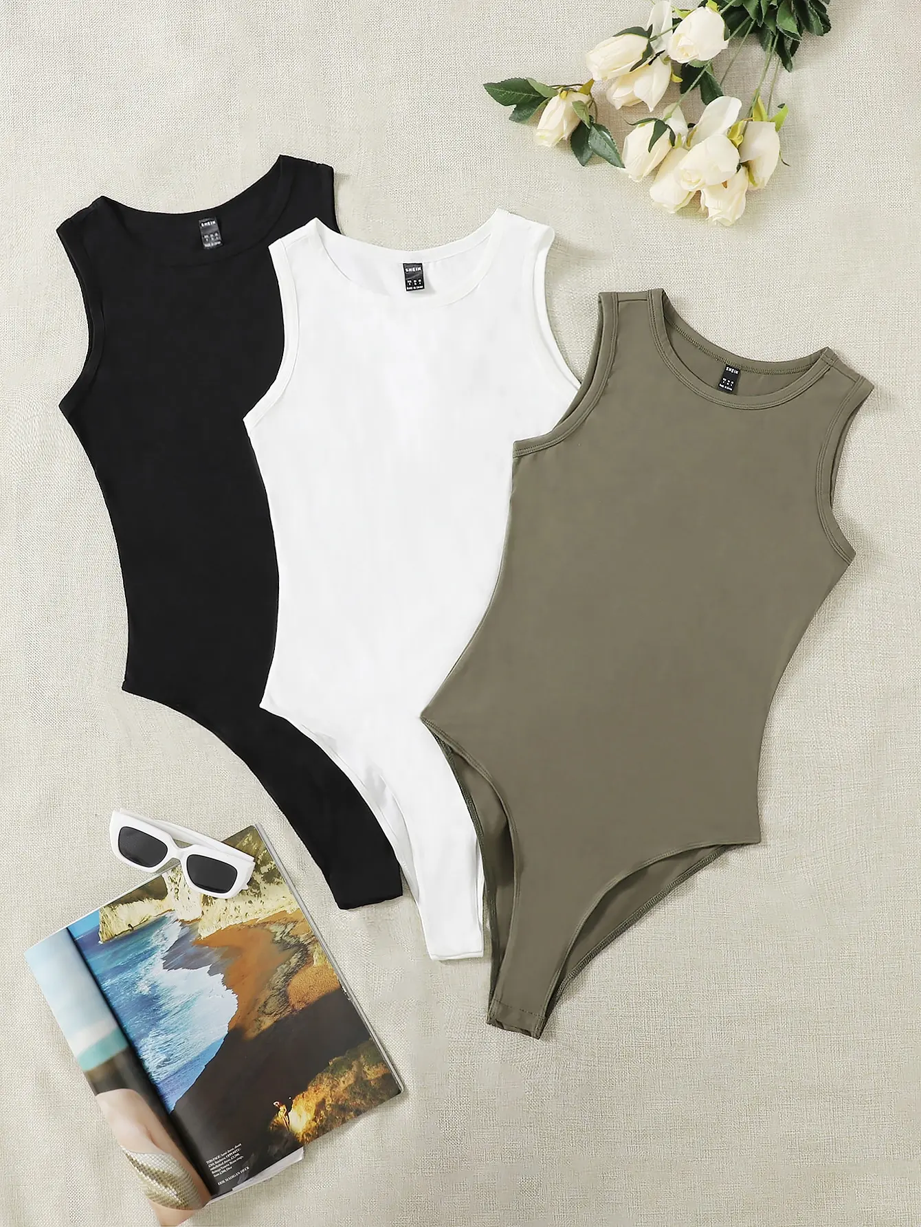 

Комплект из 3 однотонных женских боди без рукавов с круглым вырезом